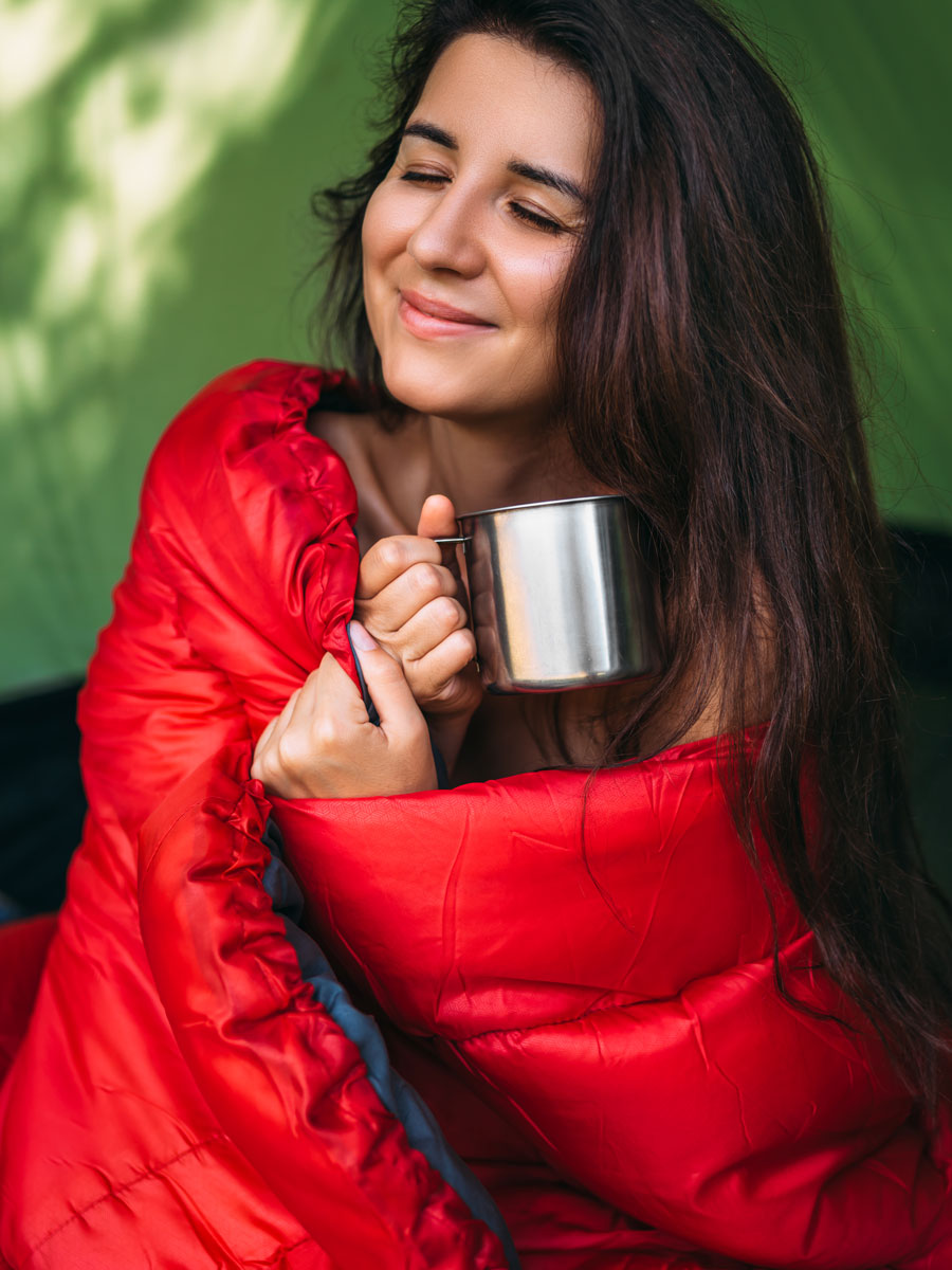 Girl with mug camping